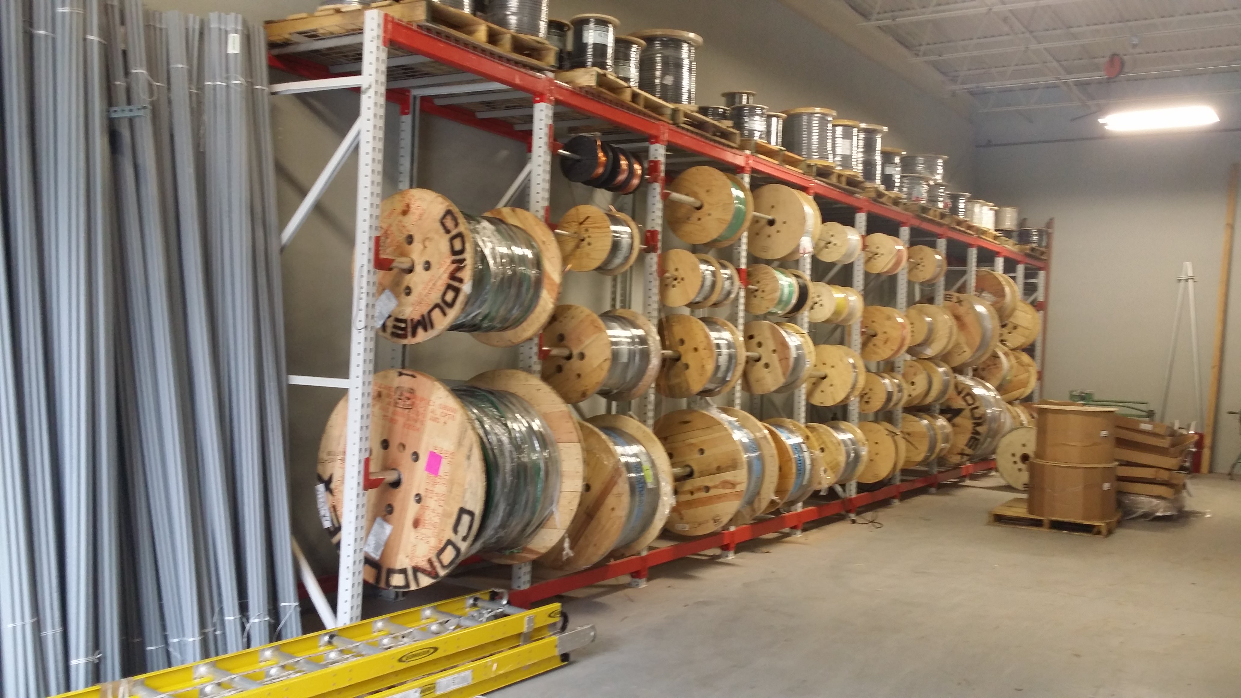 tp reconditioned teardrop cable reel storage  rack system 